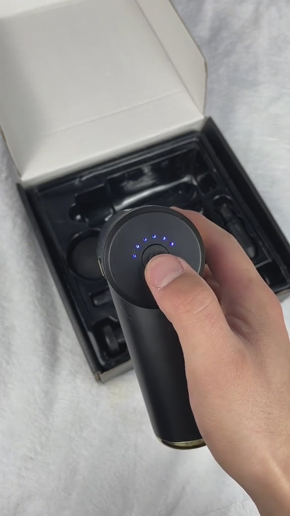 Mini hand massager with accessories